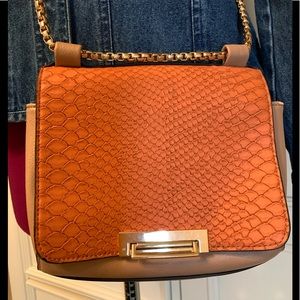 🏆 Tan and copper leather crossbody bag